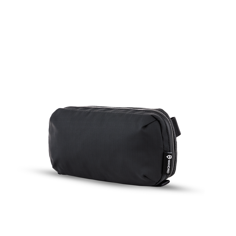 Wandrd Tech Pouch small, color negro
